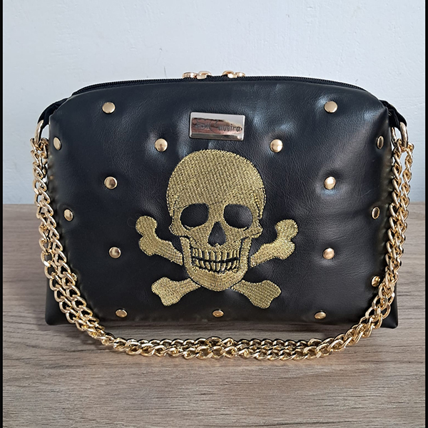 Bolsa Caveira metalizada e rebite